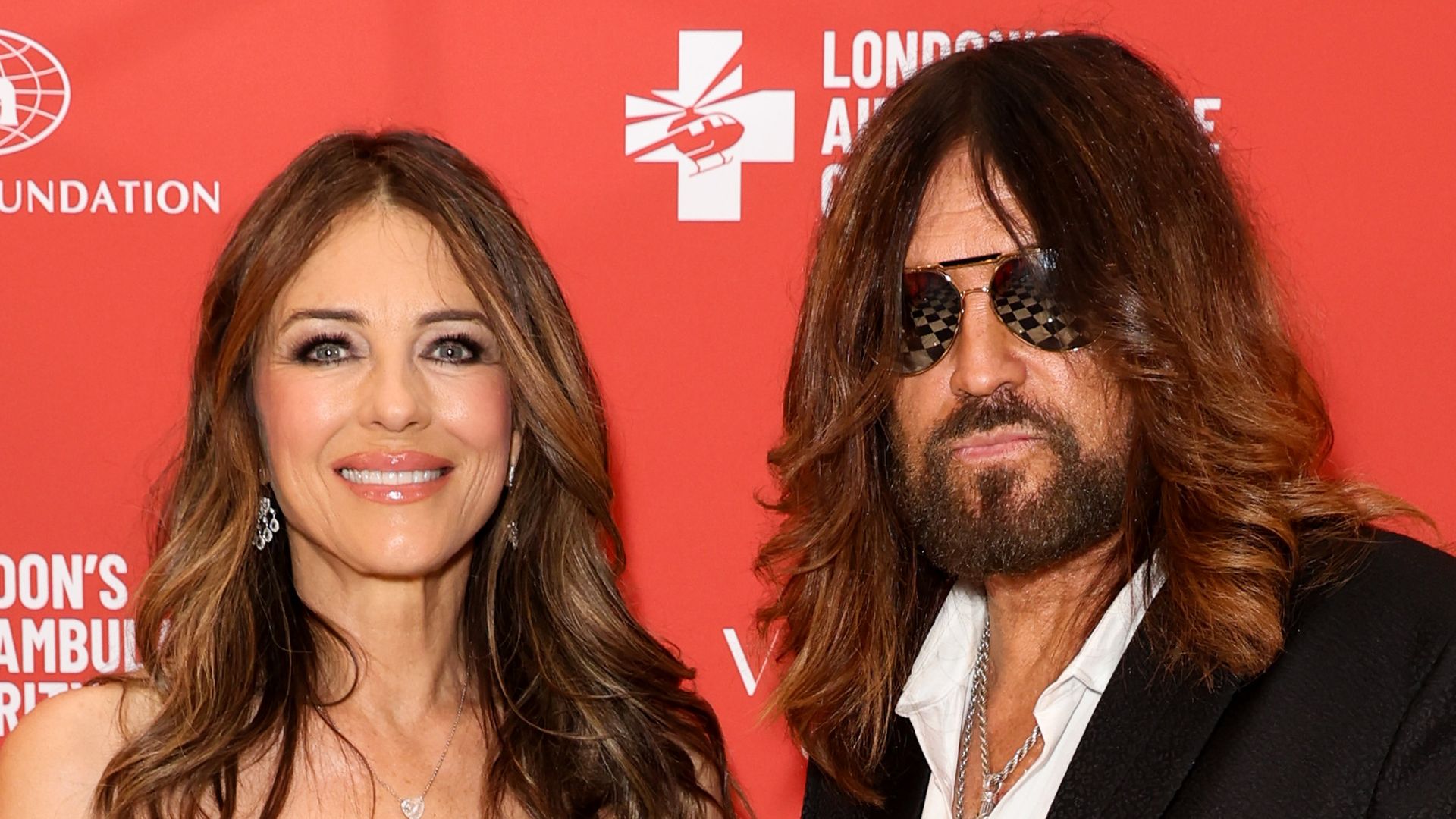 LONDON, ENGLAND - JUNE 04: Elizabeth Hurley and Billy Ray Cyrus attend the London's Air Ambulance Charity Black And White Gala at Raffles London on June 04, 2026 in London, England. (Photo by Hoda Davaine/Getty Images for London's Air Ambulance Charity)