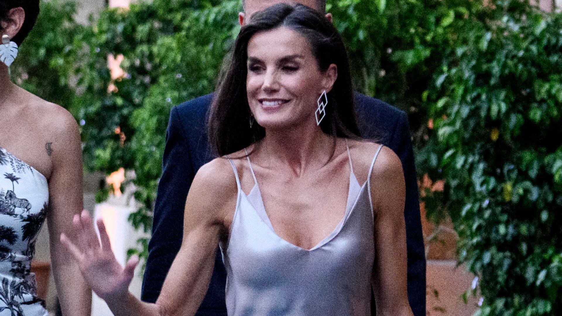 Queen Letizia of Spain wows in metallic liquid dress