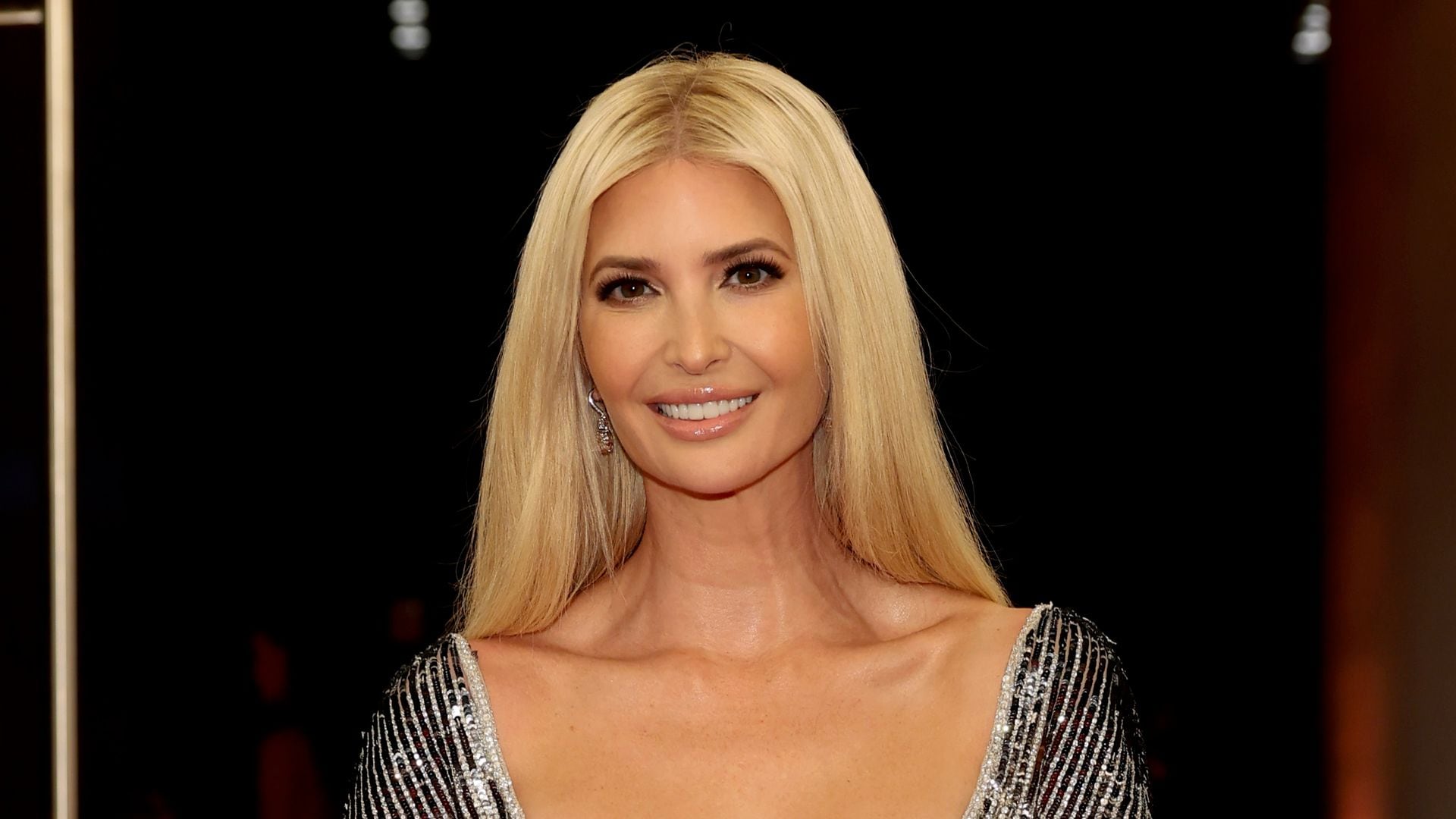 Ivanka Trump dazzles in a semi-sheer silver dress for chic date night with Jared Kushner