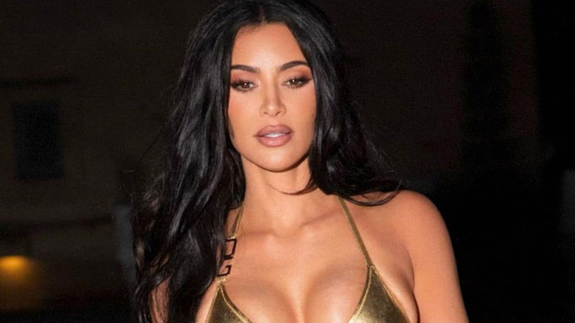 Kim Kardashian poses poolside in tiny bikini during Italian vacation