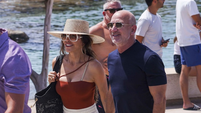 Lauren Sanchez Bezos wore a brick red one piece swimsuit that she matched with an off white skirt
