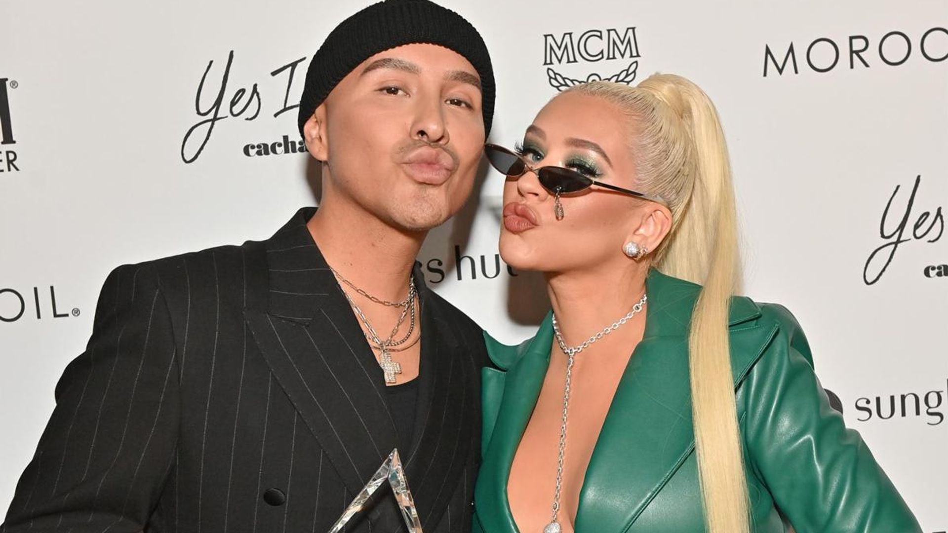 Christina Aguilera celebrates her Mexican makeup artist, Etienne Ortega,during the Daily Front Row Awards