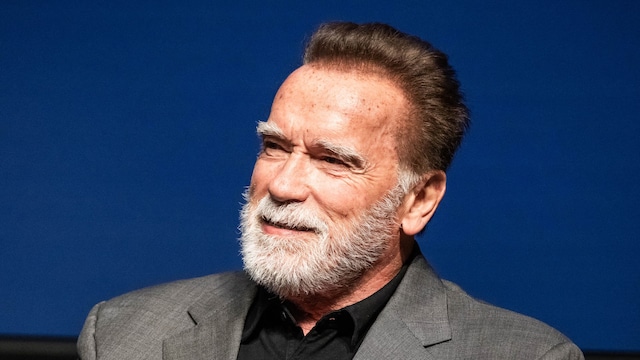 Former Gov. Arnold Schwarzenegger says using the term pollution is more relatable than talking about climate change as he speaks with Willow Bay, dean of USC Annenberg, during a three-day planet summit with the Aspen Institute at the University of Southern California in Los Angeles on Thursday, April 10, 2025. 