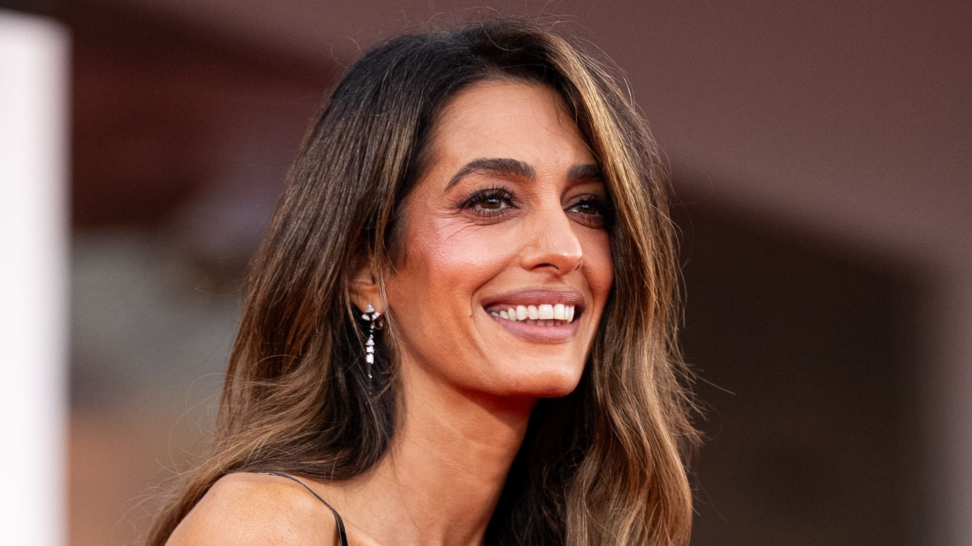 VENICE, ITALY - SEPTEMBER 02: Amal Clooney attends the "Ink" screening and opening ceremony of the 83rd Venice International Film Festival at Sala Grande on September 02, 2026 in Venice, Italy. (Photo by Alessandro Levati/Getty Images)