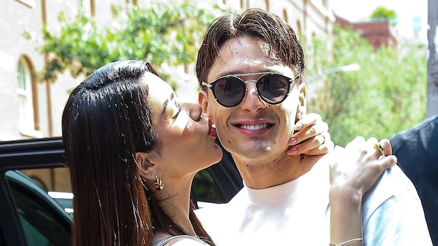 Mexican singer and rapper Peso Pluma and his girlfriend Kenia Os are seen holding hands and kissing in New York.
