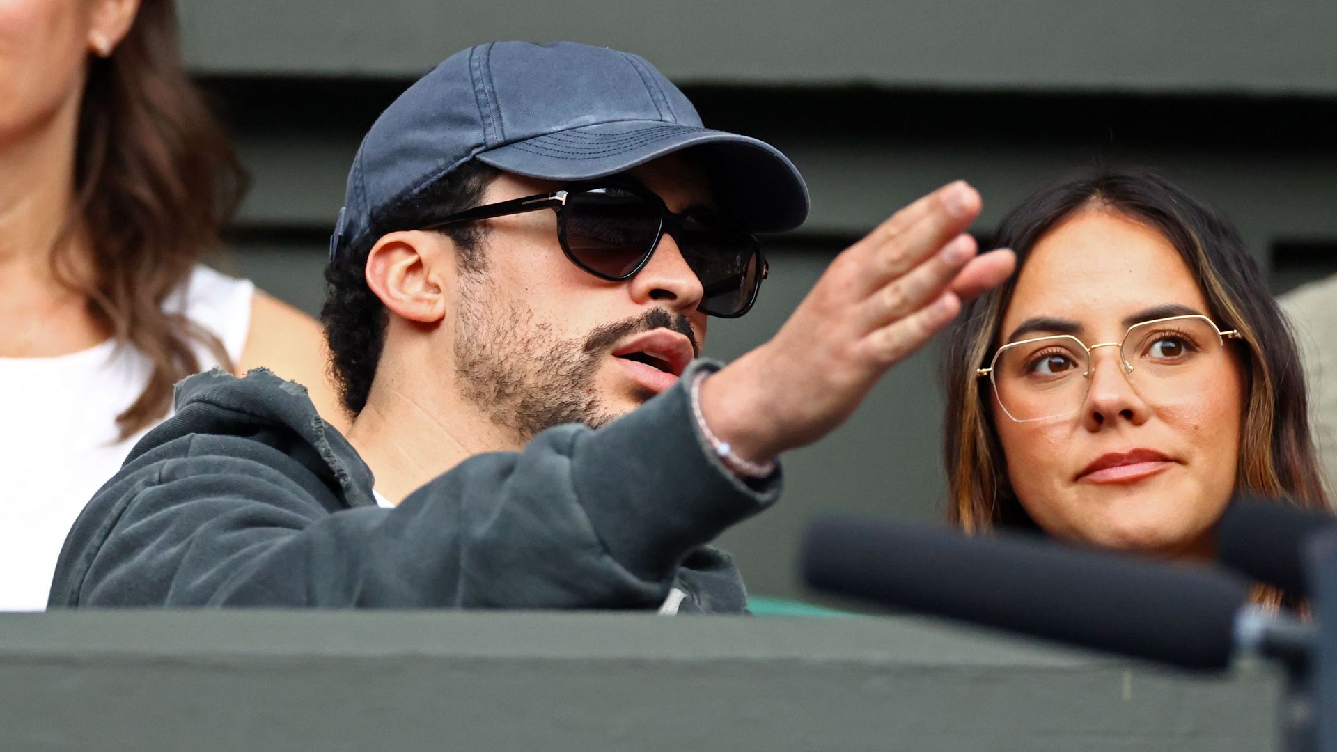 Bad Bunny and girlfriend Gabriela Berlingeri make rare Wimbledon appearance after Novak Djokovic attended his London concert