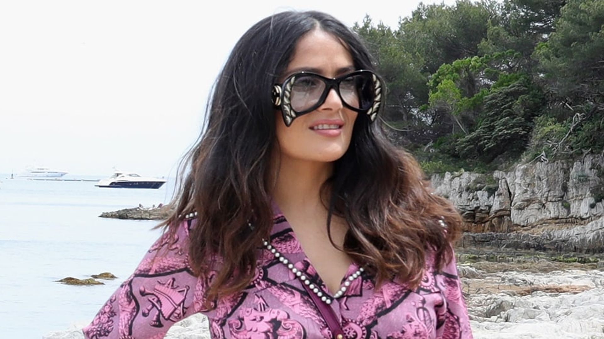Salma Hayek takes a moment from her busy life to honor National Sunglasses Day