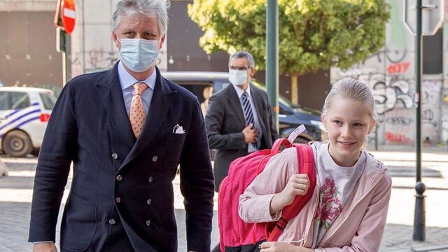 Belgian King wears face mask as he takes daughter to school