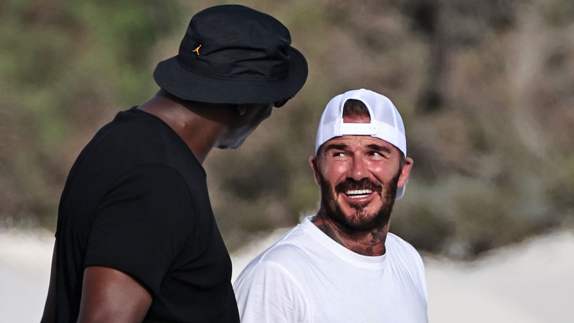 David Beckham's heartfelt reunion with sporting hero Michael Jordan says it all in new Ibiza photos