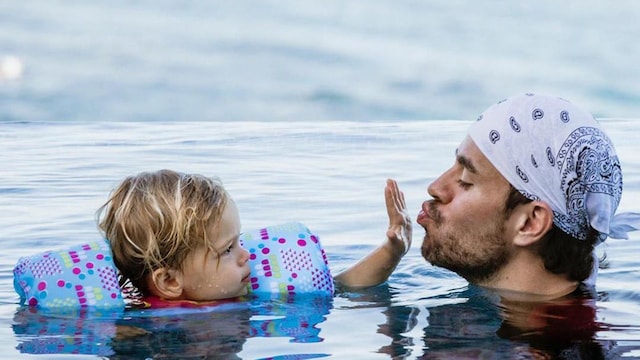 Enrique Iglesias and daughter Lucy in the water