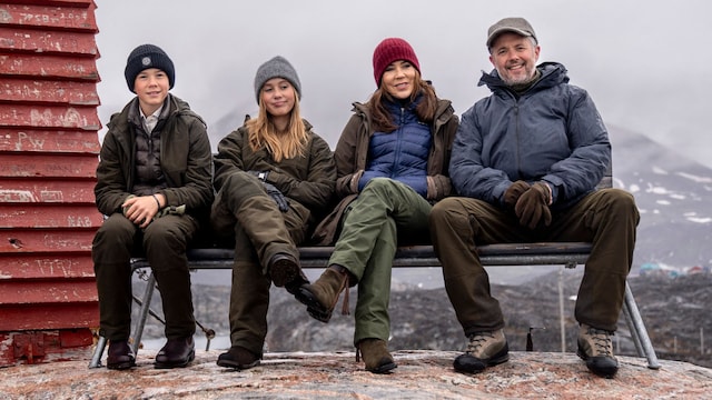 Denmarks's King Frederick X, Queen Mary, Princess Josephine and Prince Vincent pose on a bench during a visit in Qeqertarsuaq in Greenland, on June 30, 2024. Qeqertarsuaq is Greenland's largest island and home to the Arctic research station, which aims to promote Arctic natural science research. The new whale microphone provides insight into the presence of marine mammals in Disko Bay. The royal couple officially visit Greenland in the days of June 29 to July 6, 2024. The visit begins in Disko Bay and the royal couple then travels with Dannebrog south along Greenland's west coast. (Photo by Ida Marie Odgaard / Ritzau Scanpix / AFP) / Denmark OUT (Photo by IDA MARIE ODGAARD/Ritzau Scanpix/AFP via Getty Images)