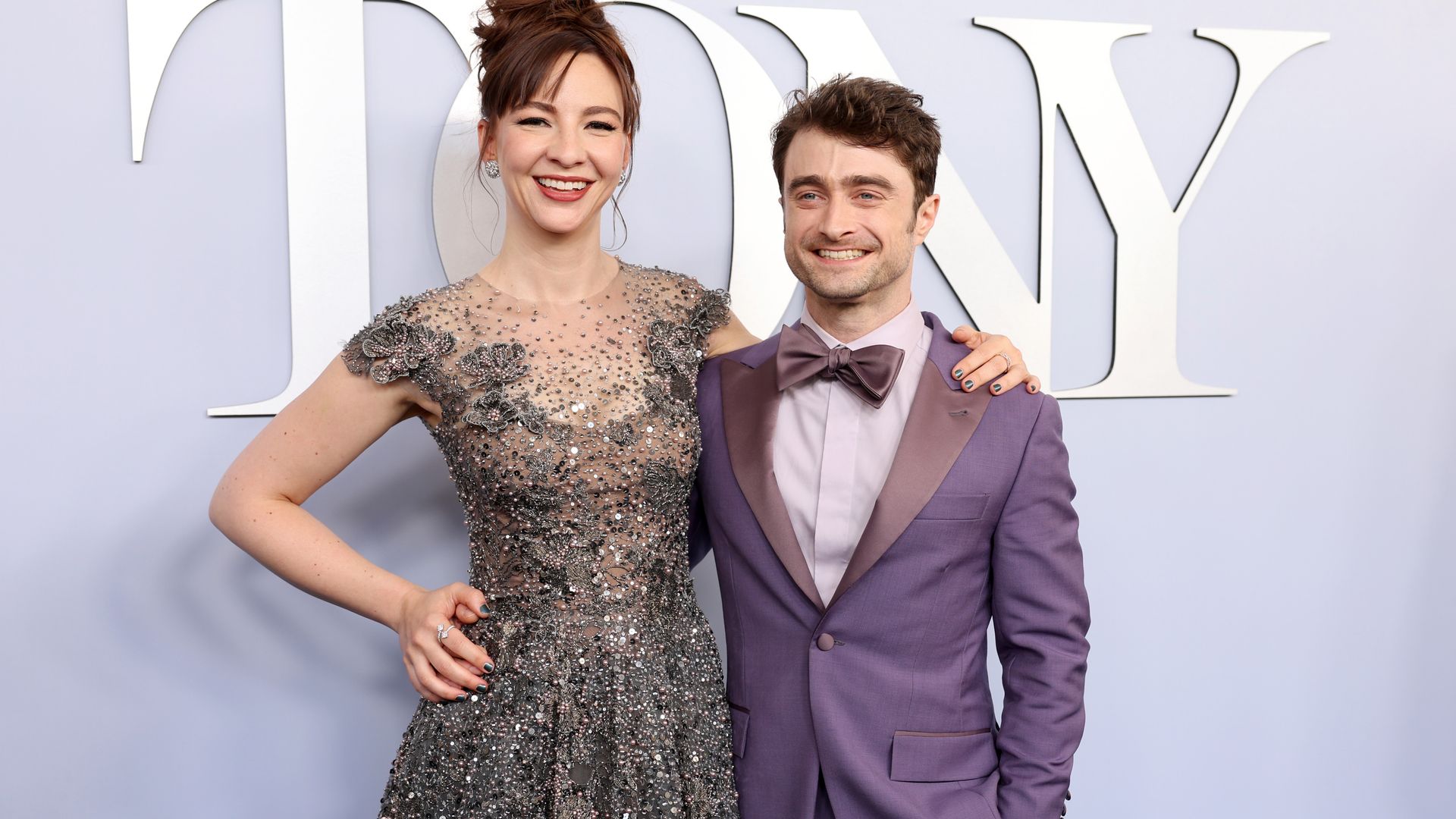 Daniel Radcliffe, his girlfriend, and his baby go for a walk in matching outfits