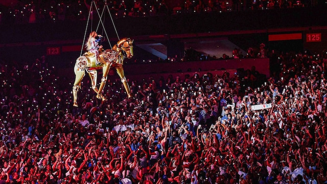 Beyoncé monts a robotic horse and "flies" over the audience at Mercedes-Benz Stadium in Atlanta, Georgia.