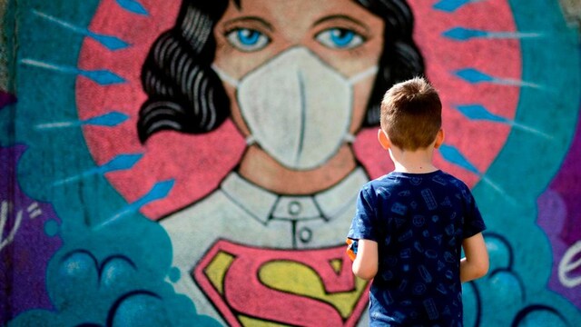 TOPSHOT-GERMANY-HEALTH-VIRUS-STREETART