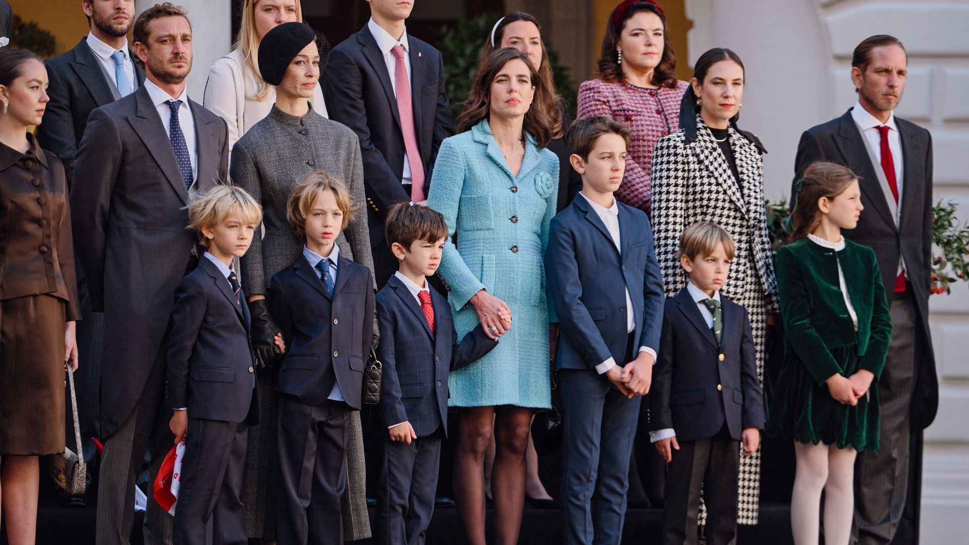 From left: the son of Caroline, Princess of Hanover, Pierre Casiraghi (2ndL), stands with his wife Beatrice Borromeo and sons Stefano Ercole Carlo Casiraghi and Francesco Carlo Albert Casiraghi, as they pose along side Chanel ambassador Charlotte Casiraghi, daughter of Caroline, Princess of Hanover, and her sons Balthazar Rassam and Raphael Elmaleh, and Tatiana Santo Domingo and her husband Andrea Casiraghi, the eldest bson of Caroline, Princess of Hanover, for a group photograph during a ceremony marking 'National Day in Monaco' also known as ' The Sovereign Prince's Day', in Monaco on November 19, 2024. (Photo by Frederic DIDES / AFP) / / NO TABLOIDS WEB & PRINT, NO DAILY MAIL, NO DAILY MAIL GROUP, NO VOICI, NO CLOSER (Photo by FREDERIC DIDES/AFP via Getty Images)