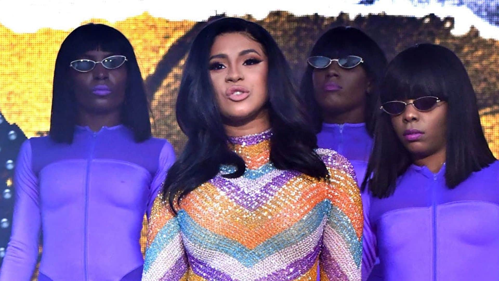 Cardi B performs in her bathrobe after suffering wardrobe malfunction – see the look!