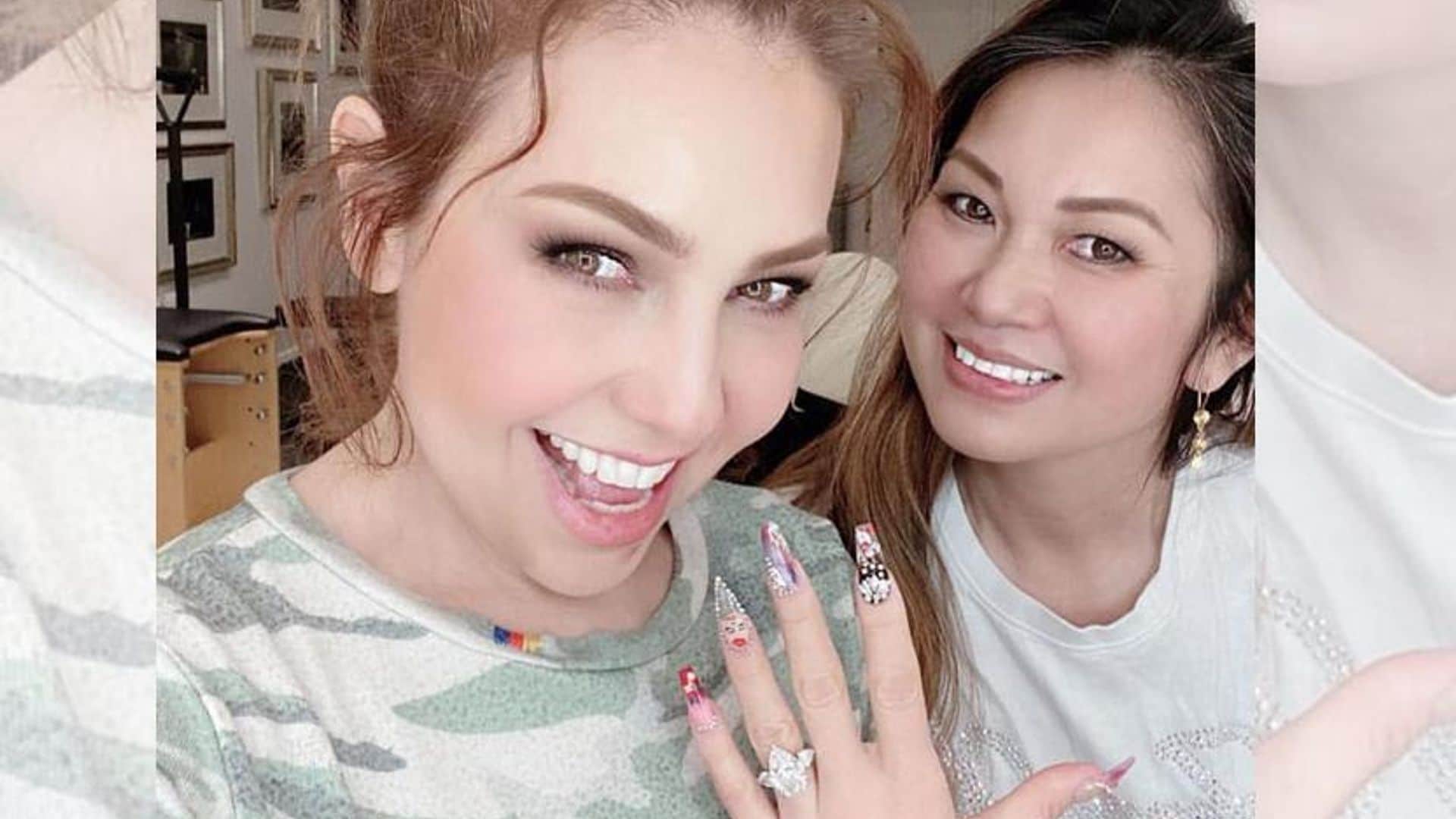 Bling out your nails like Thalía: see her insane nail art featuring gems, butterflies and Marilyn Monroe!