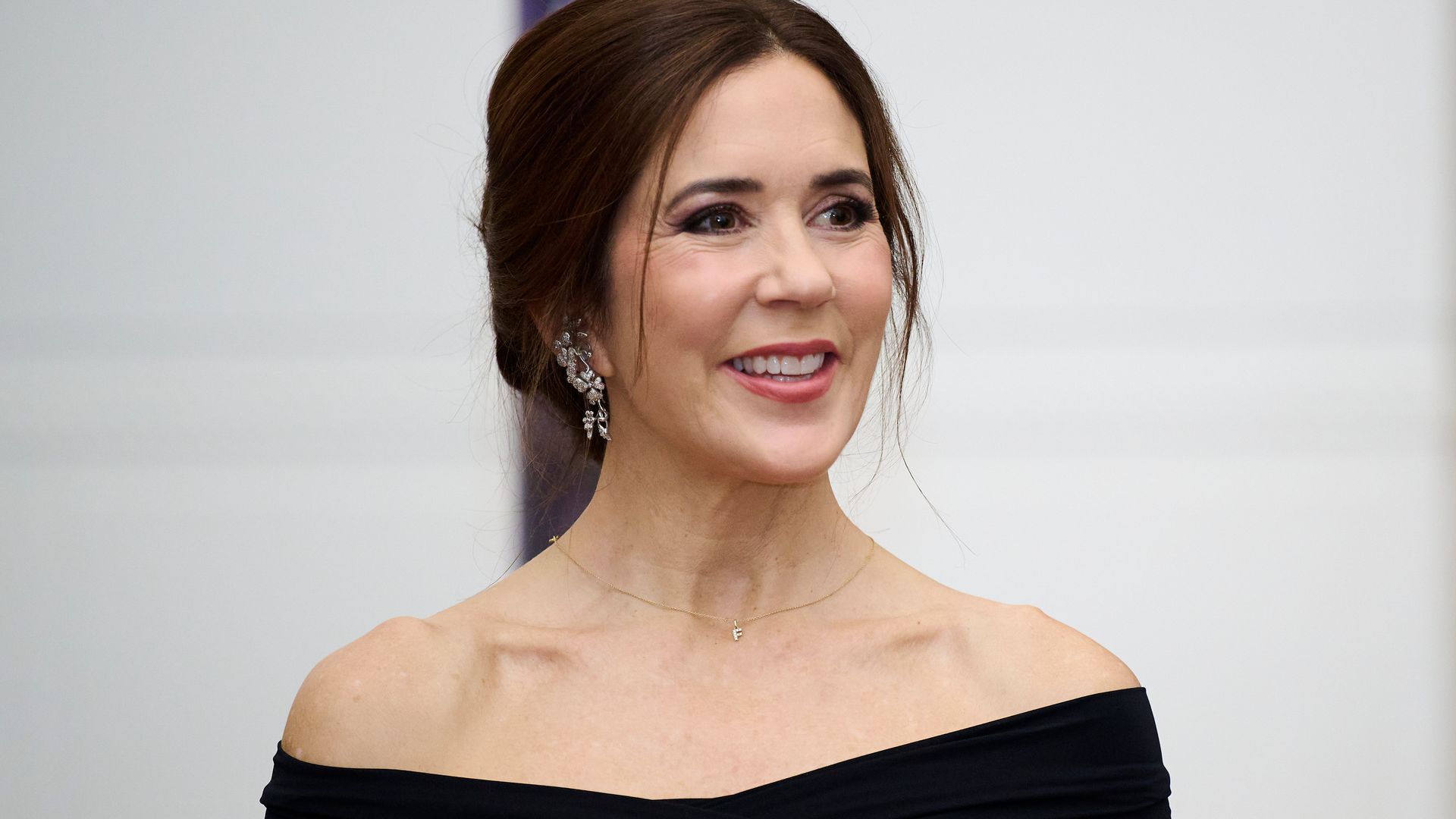 Queen Mary turns heads in sheer top, patent heels and gold-diamond jewels at Copenhagen concert