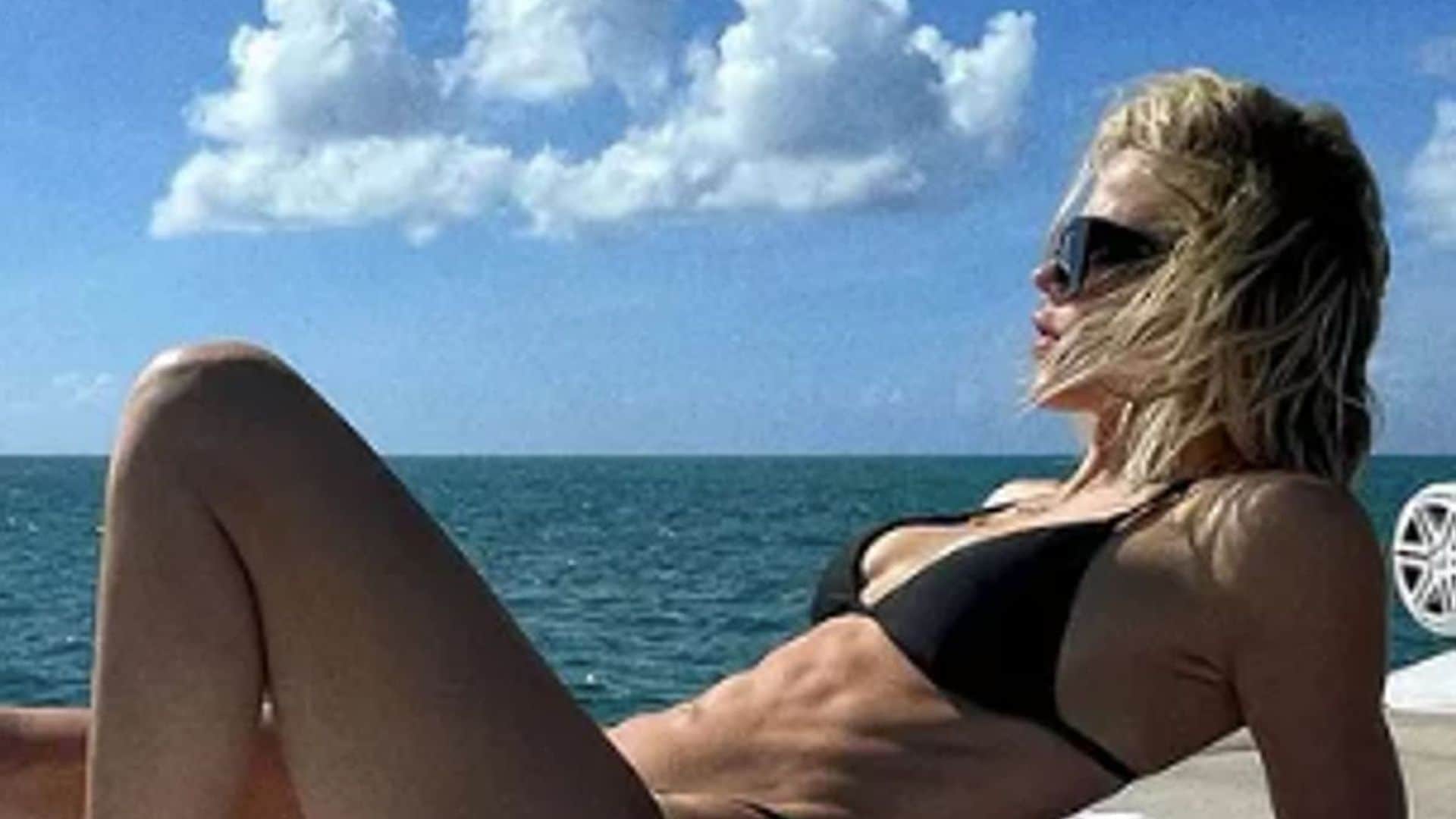 Khloé Kardashian looks unbothered in a bikini with a cryptic quote