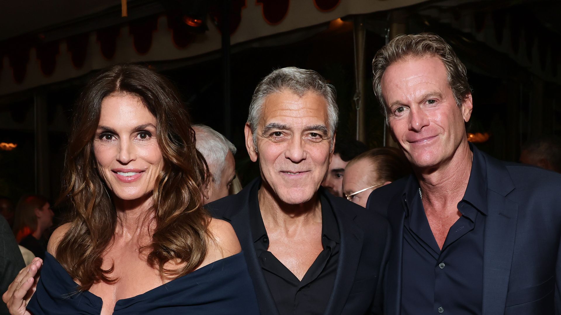 LOS ANGELES, CALIFORNIA - NOVEMBER 11: (L-R) Cindy Crawford, George Clooney, and Rande Gerber attend Netflix's "Jay Kelly" Los Angeles premiere at Chateau Marmont on November 11, 2025 in Los Angeles, California.  (Photo by Emma McIntyre/Getty Images for Netflix) 