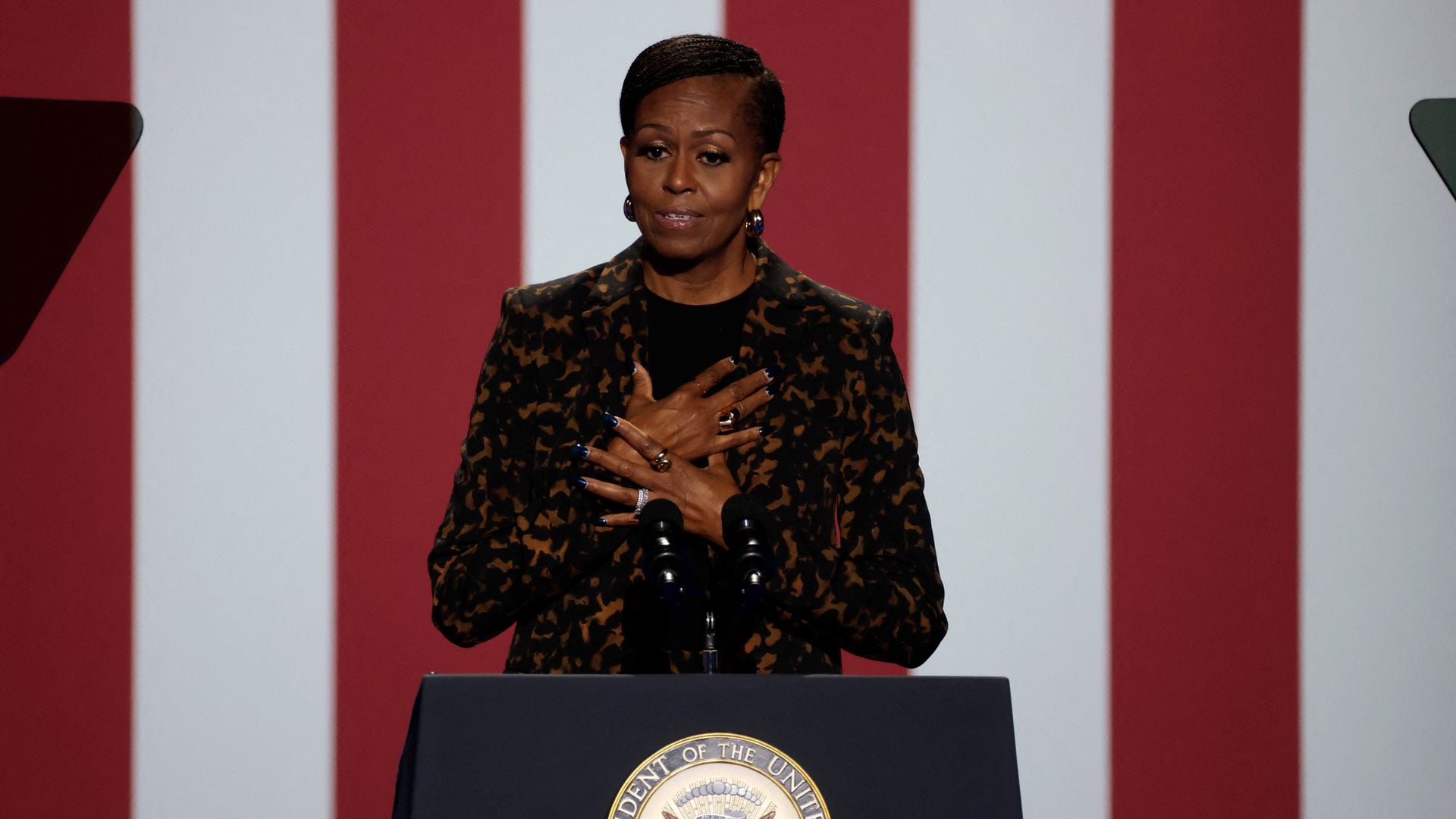 Former US First Lady Michelle Obama introduces US Vice President and Democratic presidential candidate Kamala Harris at a campaign rally at the Wings Event Center in Kalamazoo, Michigan on October 26, 2024.