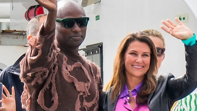 Princess MÃ¤rtha Louise of Norway (3R) and her future husband Durek Verrett wave from a boat in Alesund that will transport them to their wedding celebration in Geiranger on August 30, 2024. Princess Martha Louise, the eldest child of King Harald will tie the knot on Saturday with American self-proclaimed shaman Durek Verrett. (Photo by Heiko Junge / NTB / AFP) / Norway OUT (Photo by HEIKO JUNGE/NTB/AFP via Getty Images)