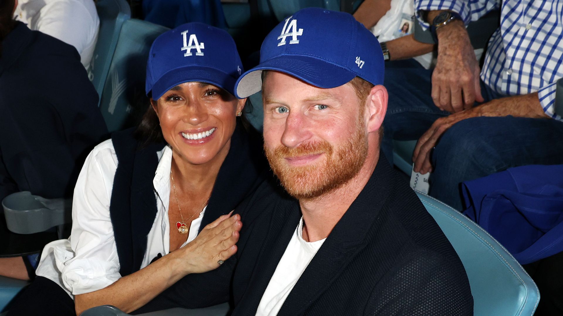 Prince Harry and Meghan Markle root for the Dodgers at the World Series