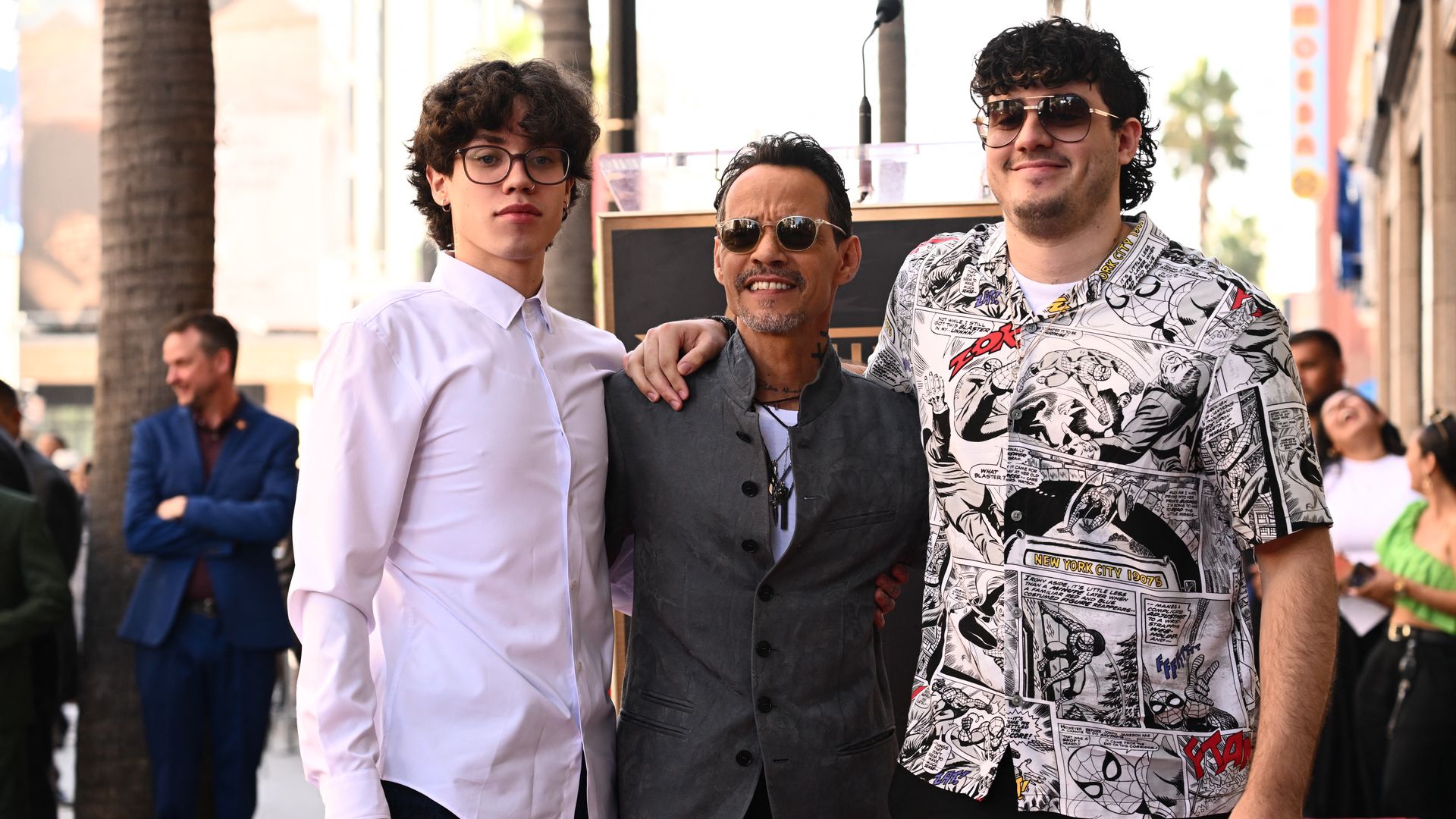 US Singer Marc Anthony (C) poses with his sons Ryan Adrian MuÃ±iz (L) and Cristian Marcus MuÃ±iz during the ceremony for Anthony's star on the Hollywood Walk of Fame in Hollywood, California on September 7, 2023. (Photo by Patrick T. Fallon / AFP) (Photo by PATRICK T. FALLON/AFP via Getty Images) 