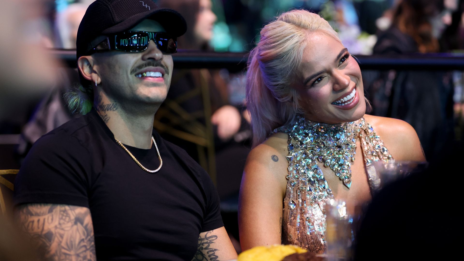 Karol G and Feid pack on PDA at the Copa América