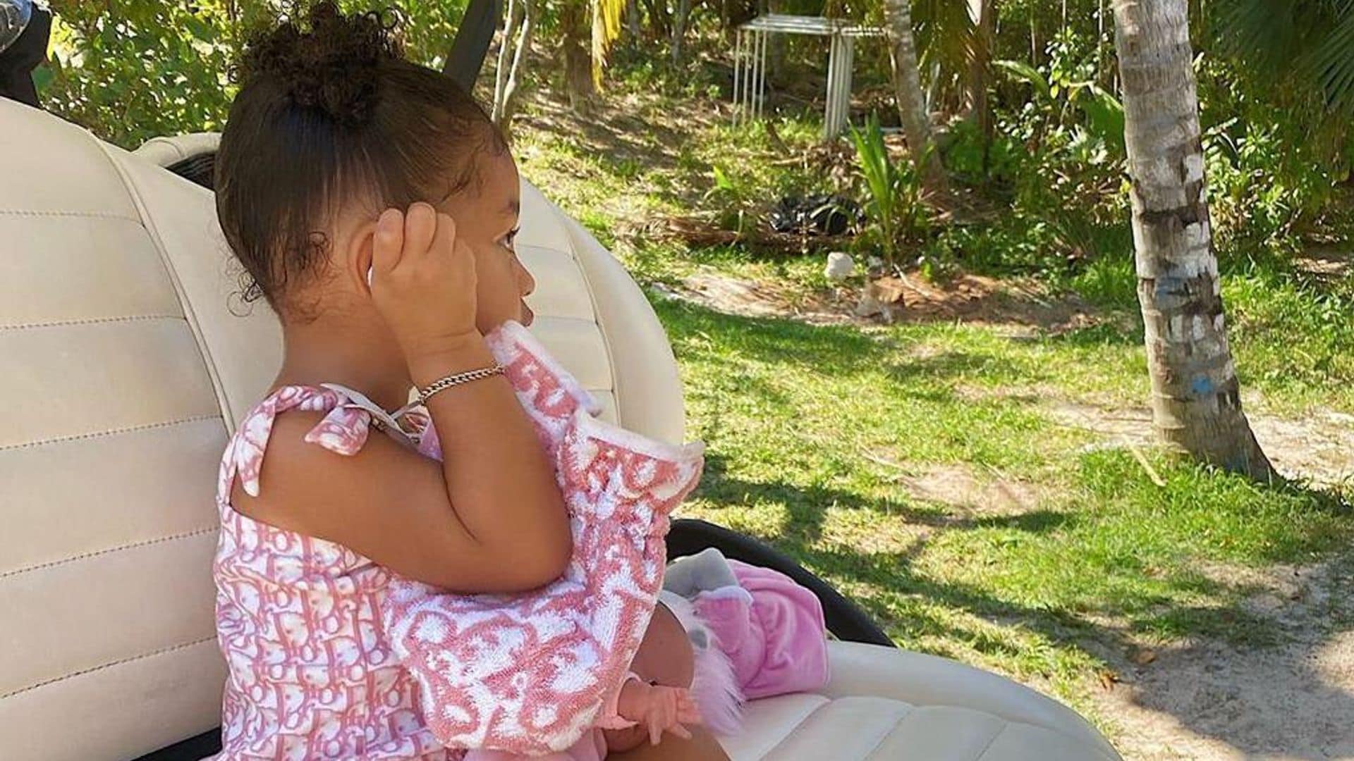 Kylie Jenner’s daughter Stormi pairs luxe Dior swimsuit with jelly shoes