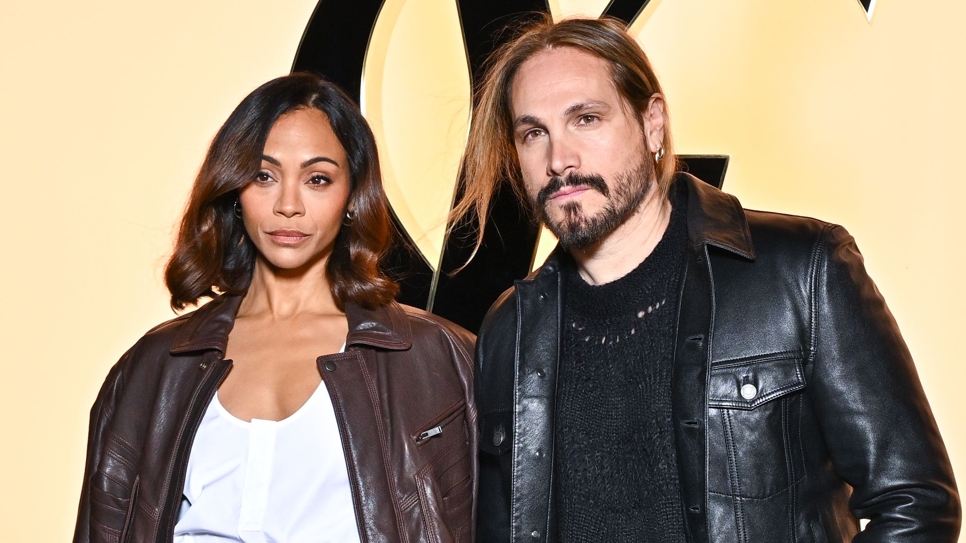 Zoe Saldaña wears sky-high platform heels in Paris and shares sweet moment with Marco Perego