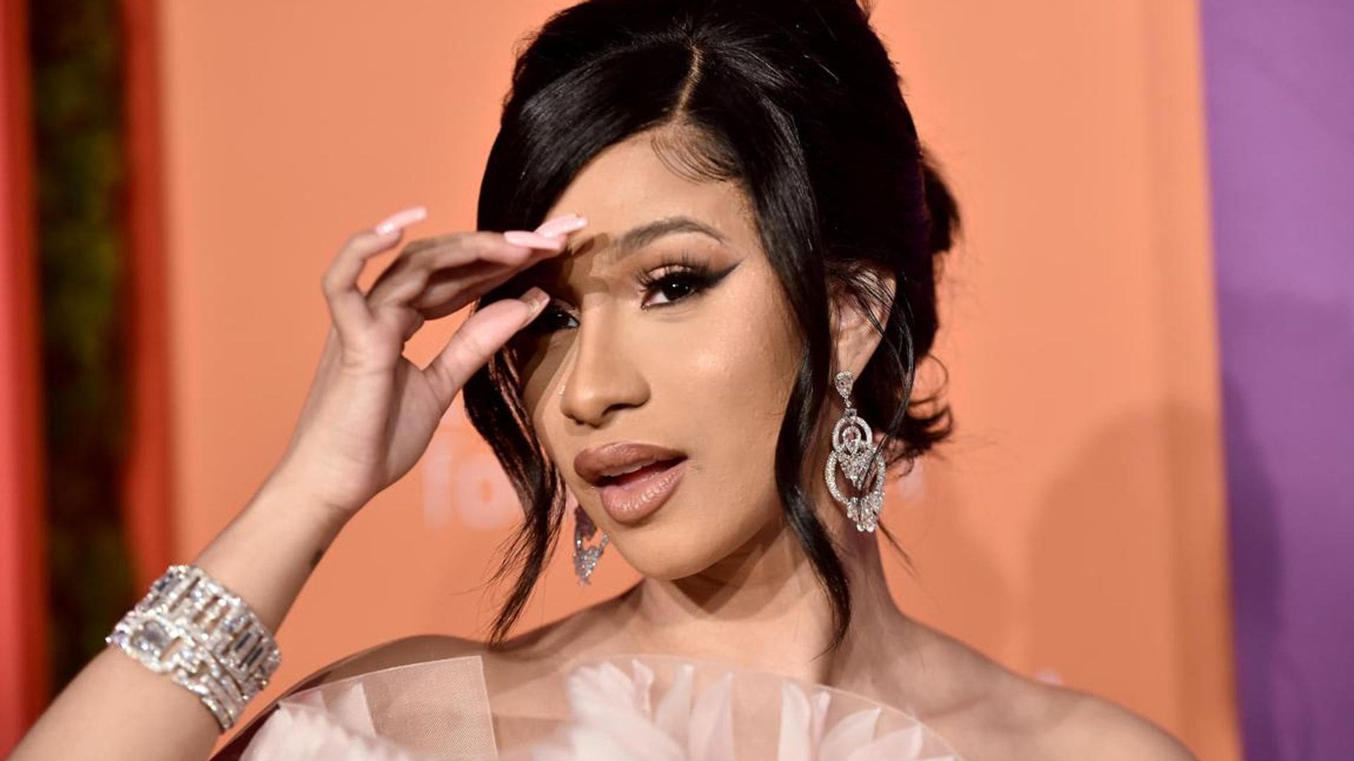 Cardi shows off toned bod in tiny bikini after admitting to weight gain