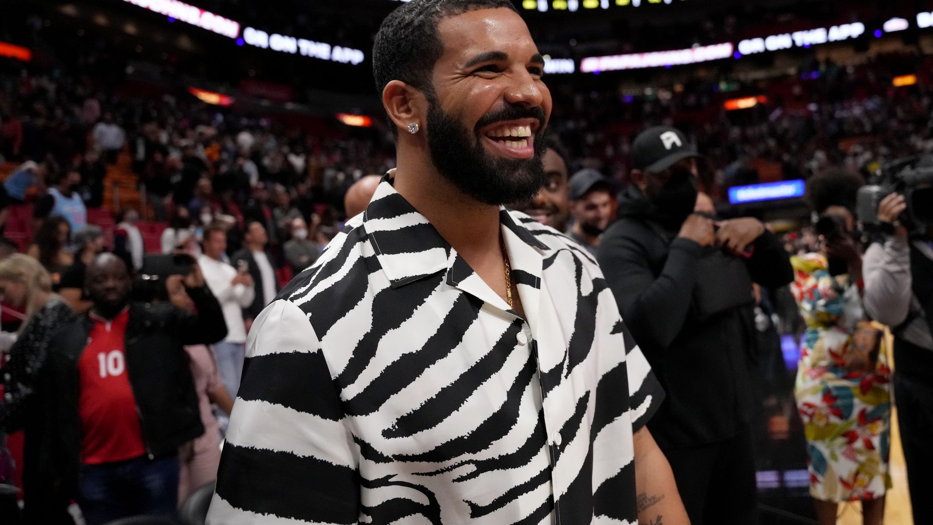 Drake reacts after attending the game between the Miami Heat and the Atlanta Hawks