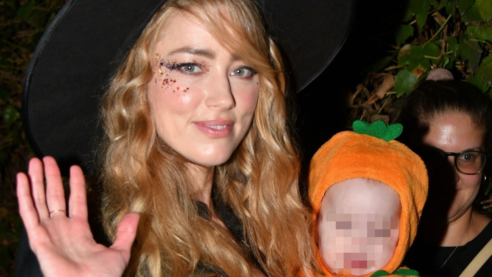 Amber Heard continues her Halloween tradition, this year joined by all three of her daughters for a festive night out