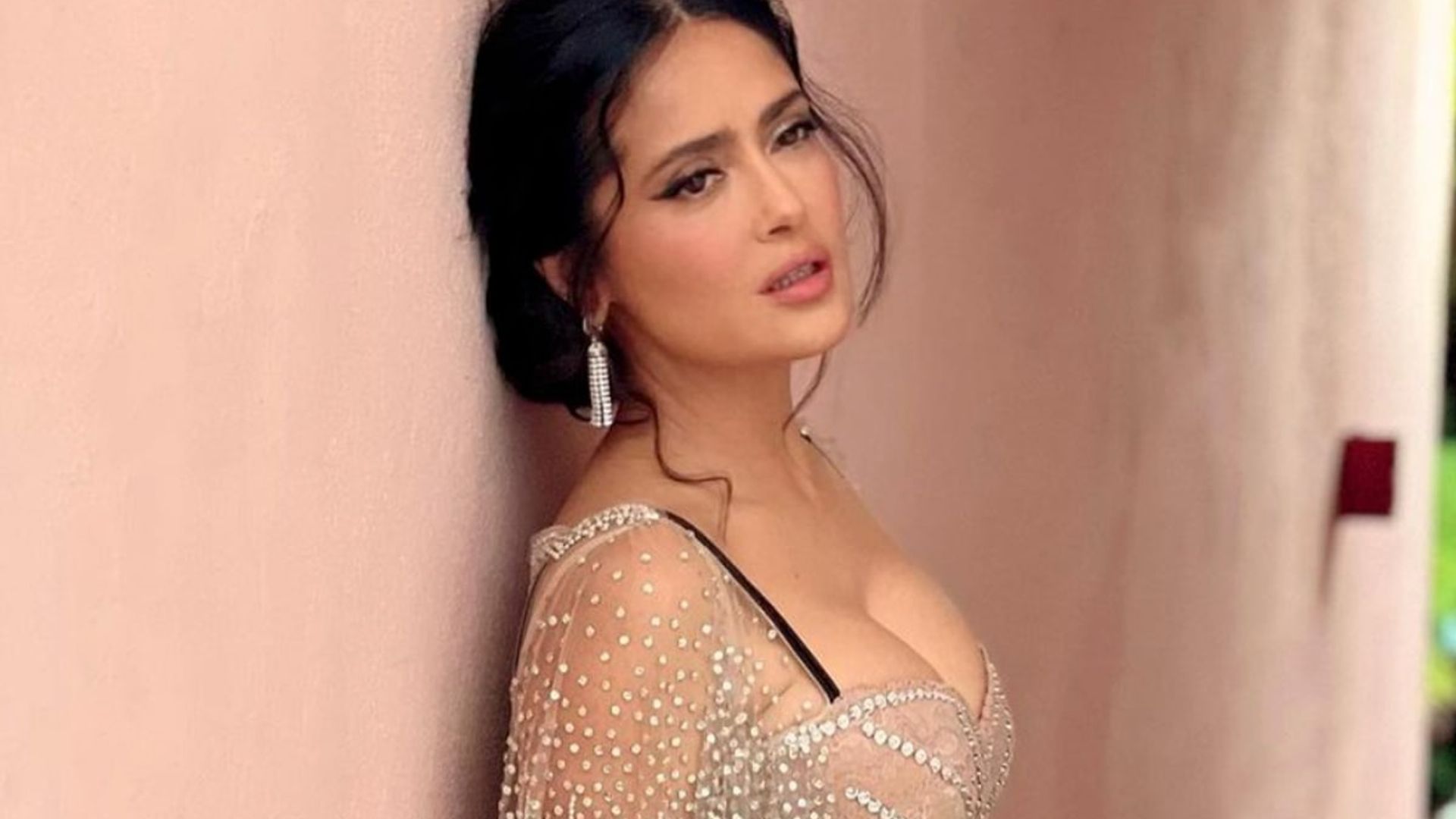 Salma Hayek shows off her curves in turquoise bikini while swimming in Mexico