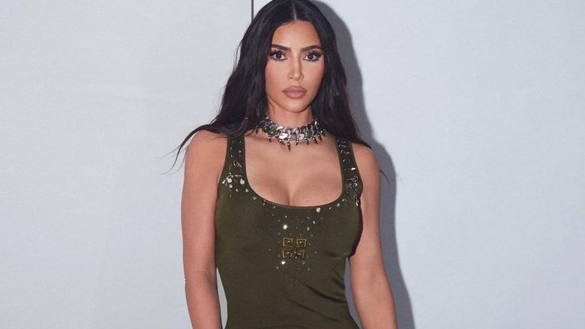 Kim Kardashian dons a green Givenchy gown to celebrate Fashion Week