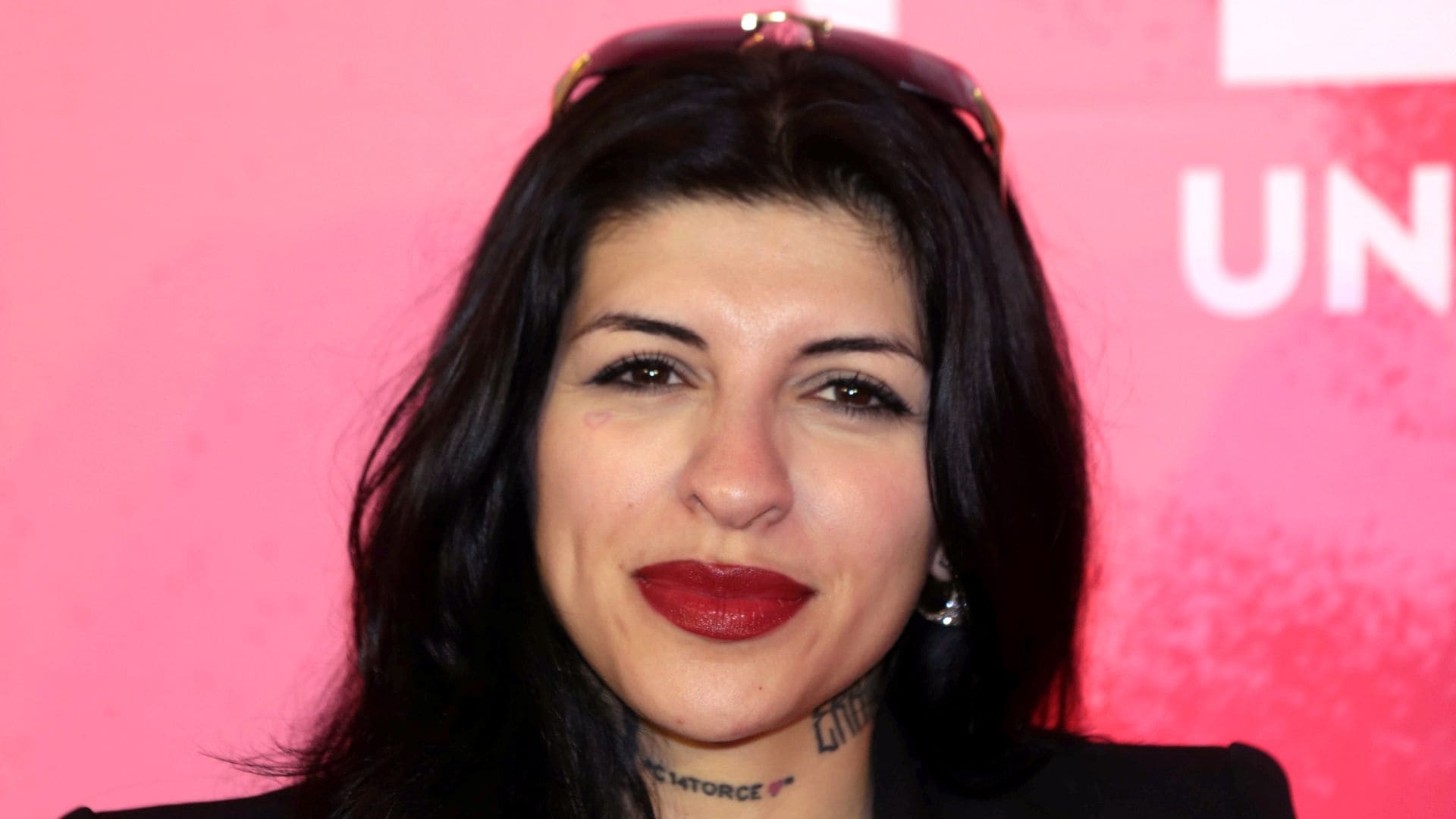 Argentine singer and songwriter Julieta Emilia Cazzuchelli, better knows as 'Cazzu',  looks at the camera during the presentation of the book Perreo, Una RevoluciÃ³n at Editorial Penguin Random on August 12, 2025 in Mexico City, Mexico. 