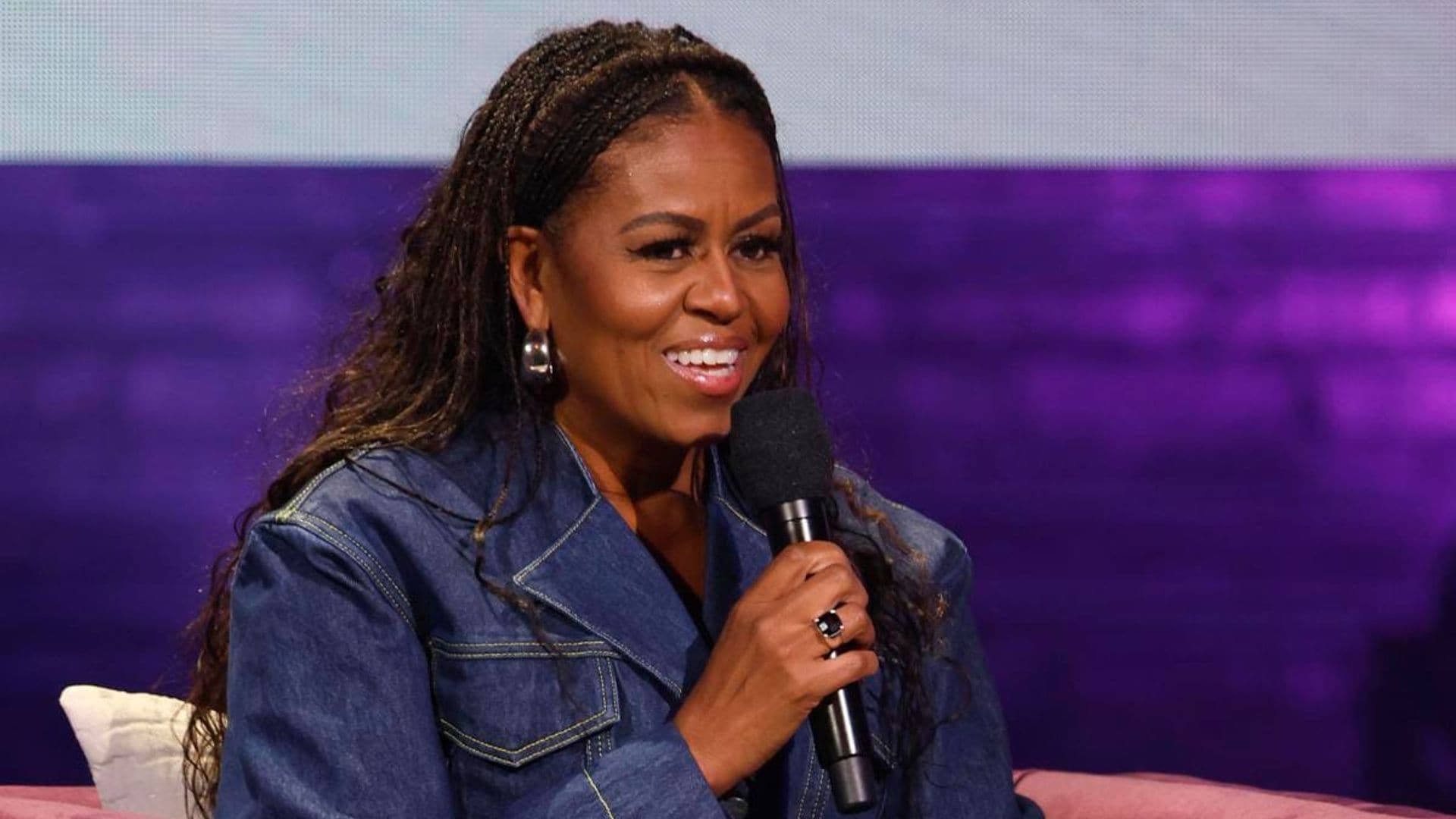 Michelle Obama kicks off her book tour in denim and heels