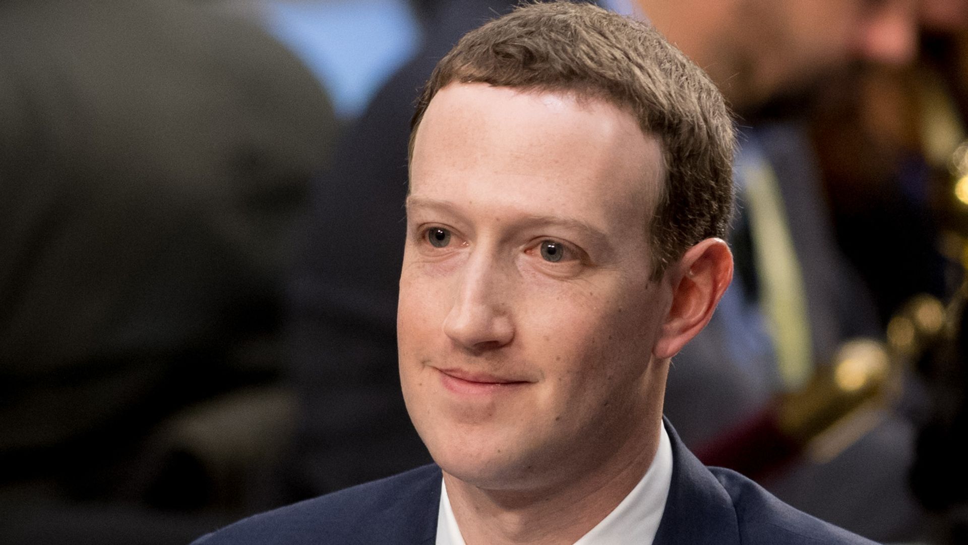 Facebook founder and CEO Mark Zuckerberg testifies during a Senate Commerce, Science and Transportation Committee and Senate Judiciary Committee joint hearing abo ut Facebook on Capitol Hill in Washington, DC, April 10, 2018.
Facebook chief Mark Zuckerberg apologized to US lawmakers Tuesday for the leak of personal data on tens of millions of users as he faced a day of reckoning before a Congress mulling regulation of the global social media giant.In his first-ever US congressional appearance, the Facebook founder and chief executive sought to quell the storm over privacy and security lapses at the social network that have angered lawmakers and Facebook's two billion users.
 / AFP PHOTO / SAUL LOEB        (Photo credit should read SAUL LOEB/AFP via Getty Images)