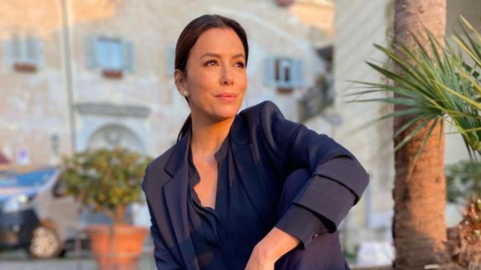 Eva Longoria goes makeup free and shows off grey roots during plank challenge
