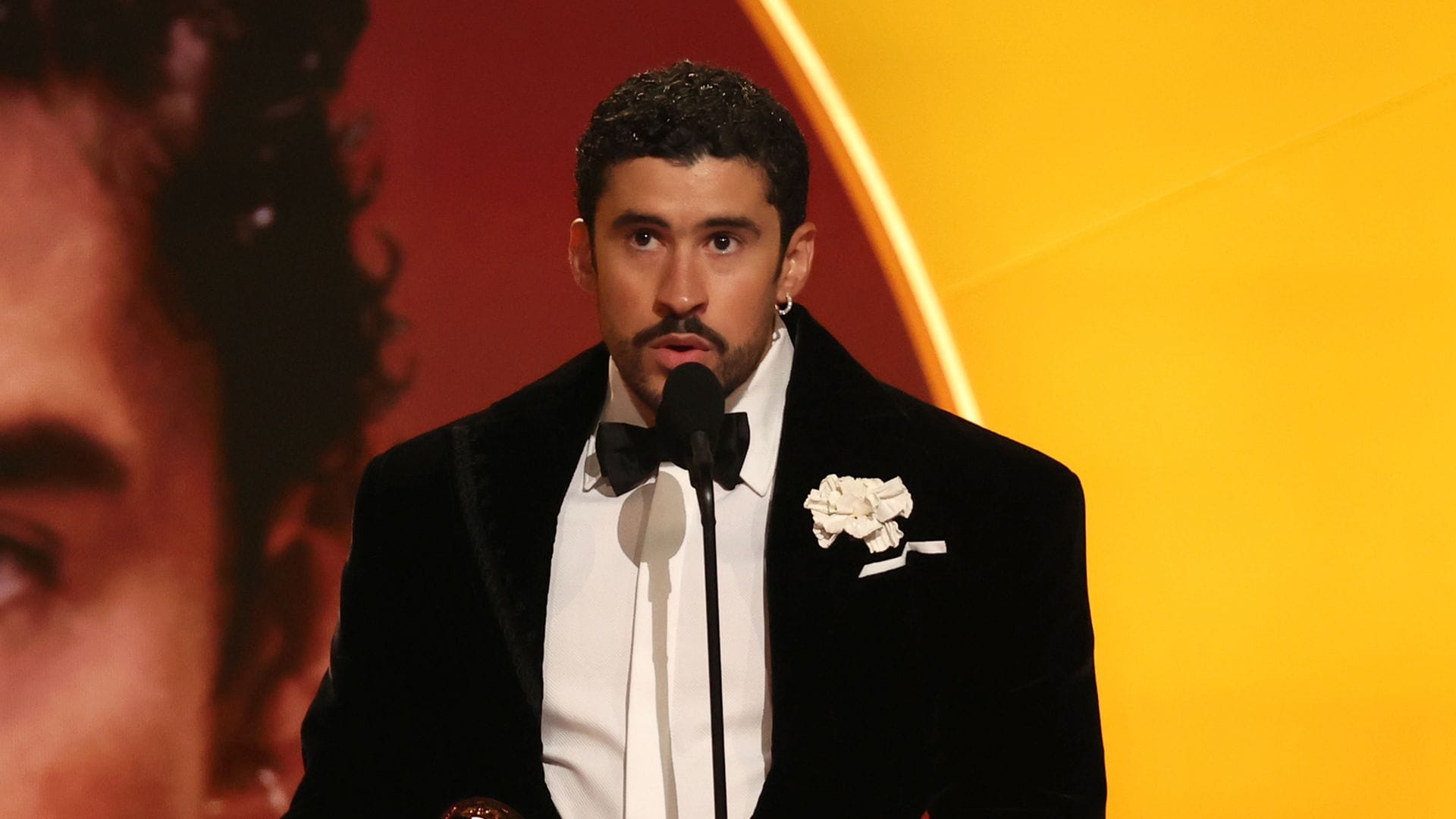 LOS ANGELES, CALIFORNIA - FEBRUARY 01: Bad Bunny accepts the Best MÃºsica Urbana Album award for "DeBÃ TiRAR MÃ¡S FOToS" onstage during the 68th GRAMMY Awards at Crypto.com Arena on February 01, 2026 in Los Angeles, California.  (Photo by Johnny Nunez/Getty Images for The Recording Academy) 