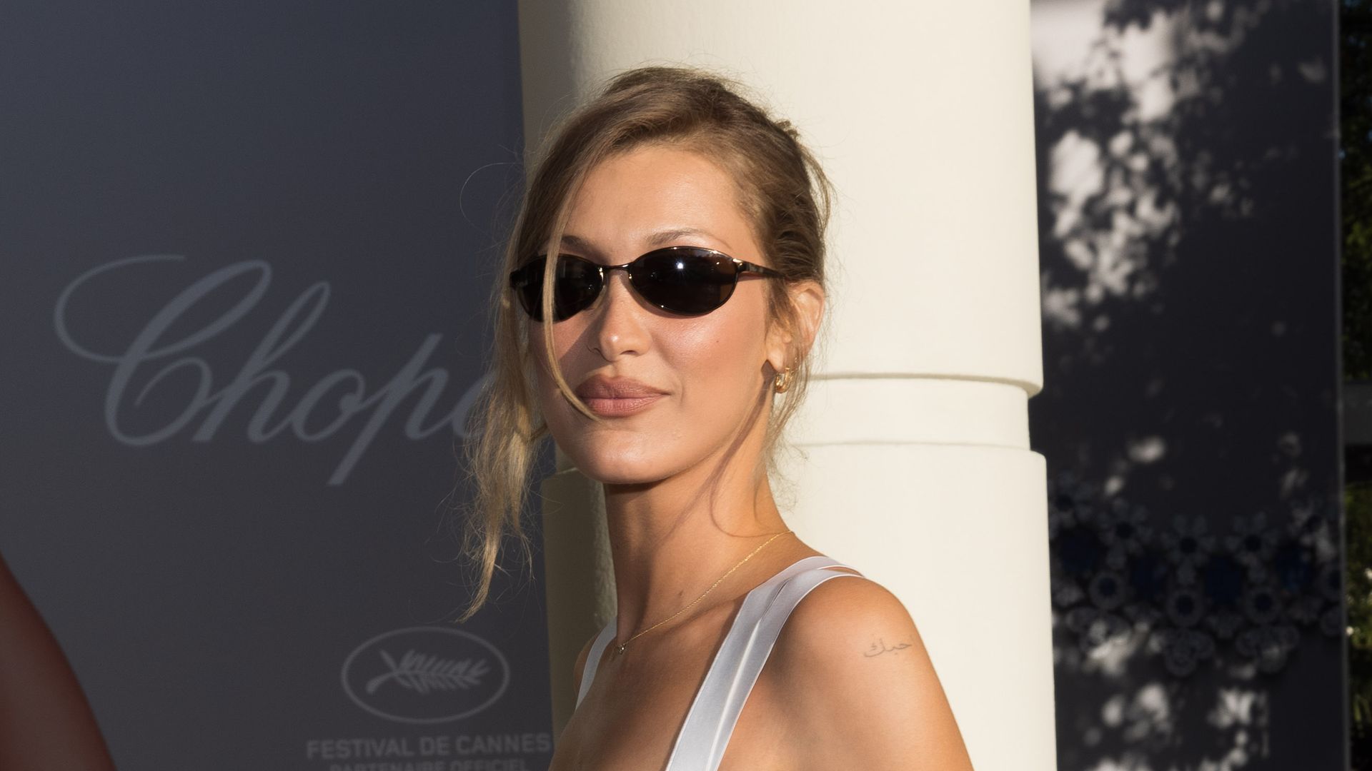 Bella Hadid poses in a golden bikini — and her yoga body is unreal