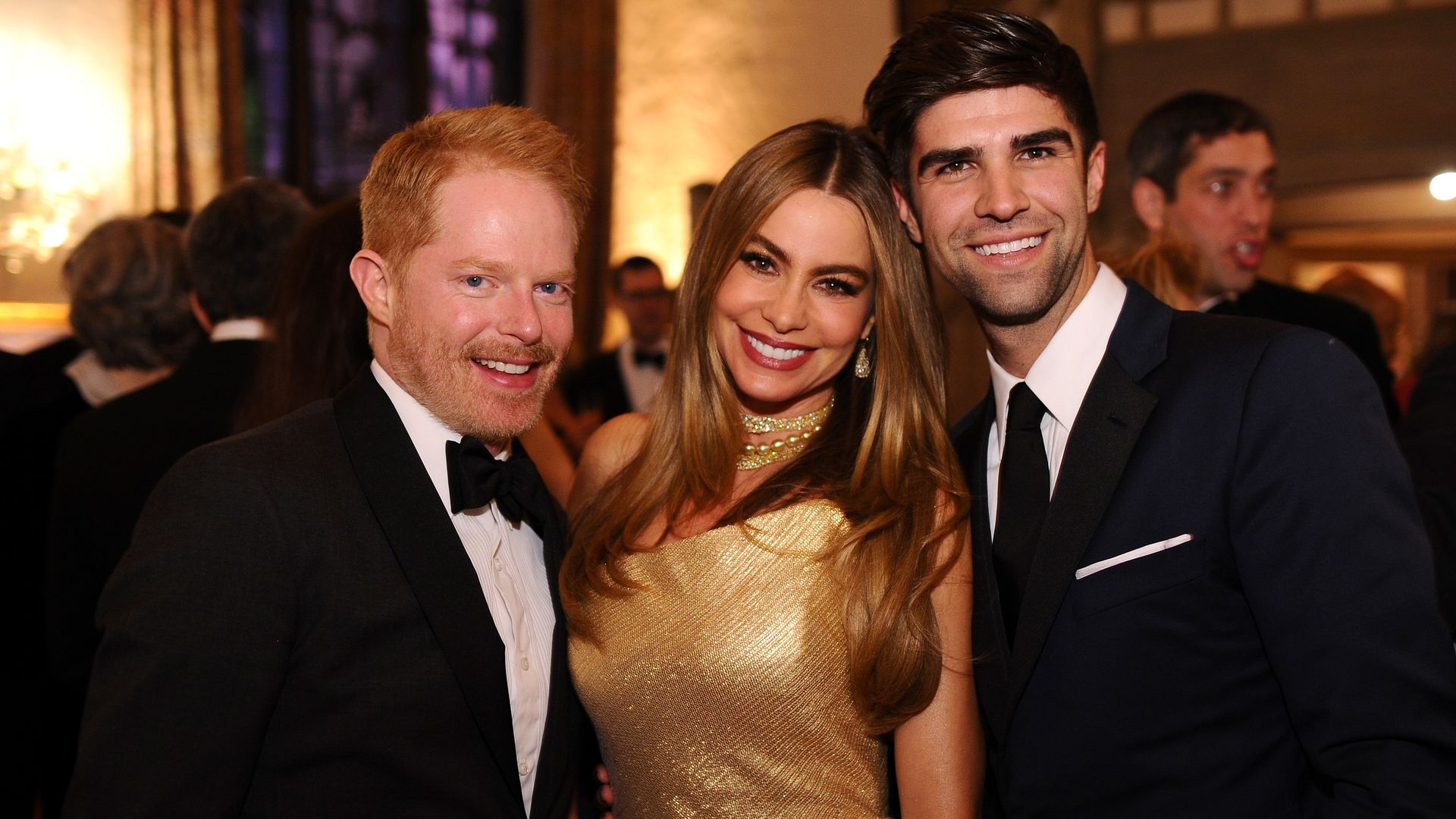 Jesse Tyler Ferguson, Sofia Vergara and Justin Mikita attend the Bloomberg & Vanity Fair cocktail reception