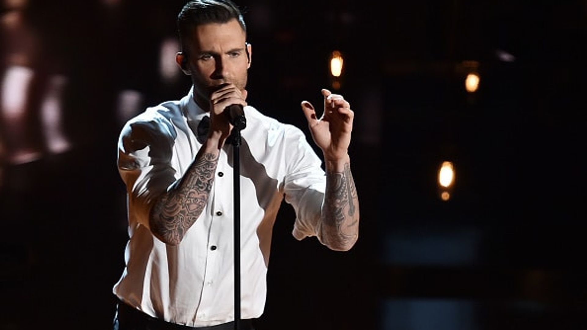 Adam Levine attacked by female fan during Maroon 5 concert