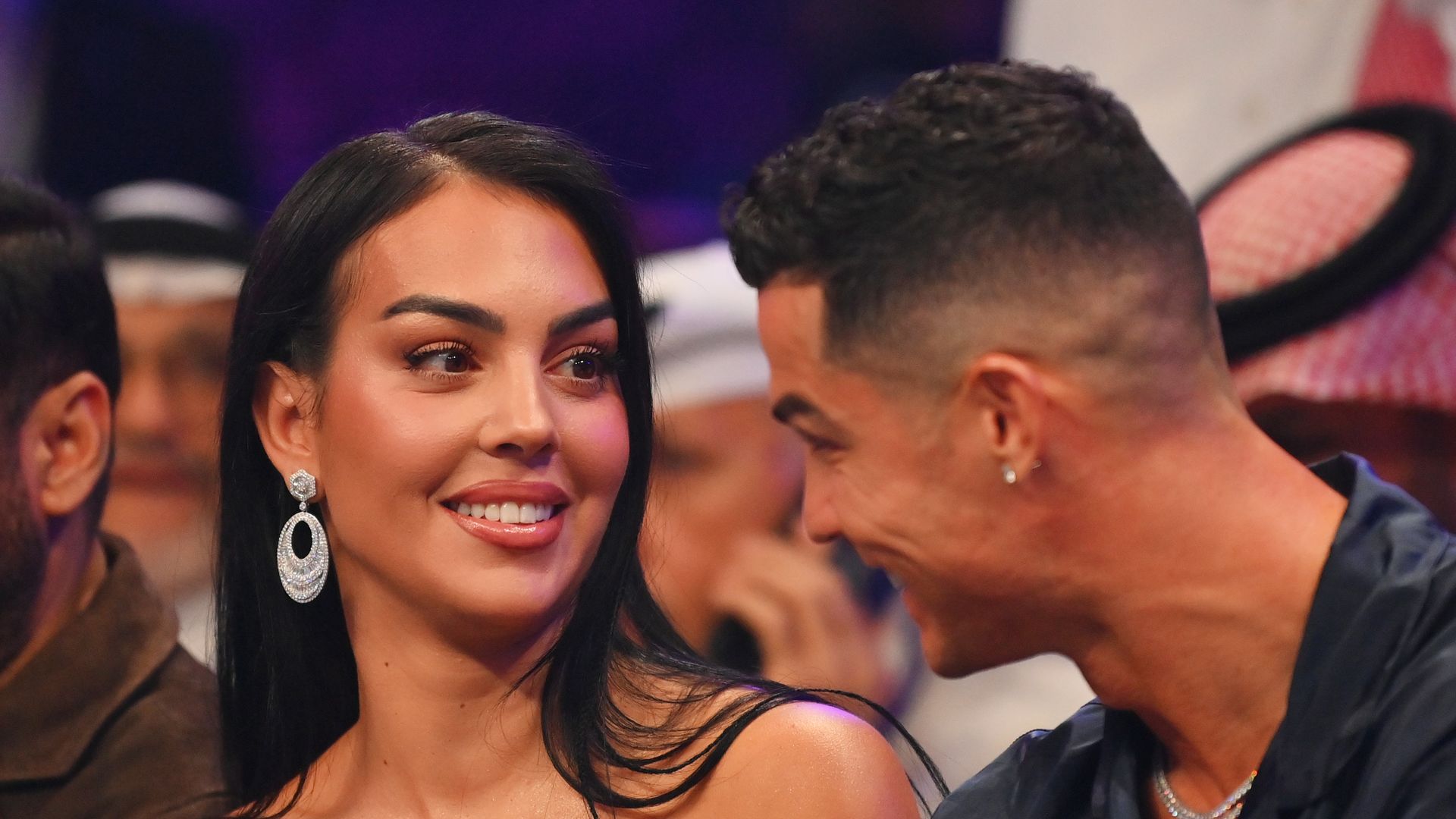 Cristiano Ronaldo and his wife Georgina RodrÃguez speak ringside prior to the Heavyweight fight between Tyson Fury and Francis Ngannou at Boulevard Hall on October 28, 2023 in Riyadh, Saudi Arabia. (Photo by Justin Setterfield/Getty Images)