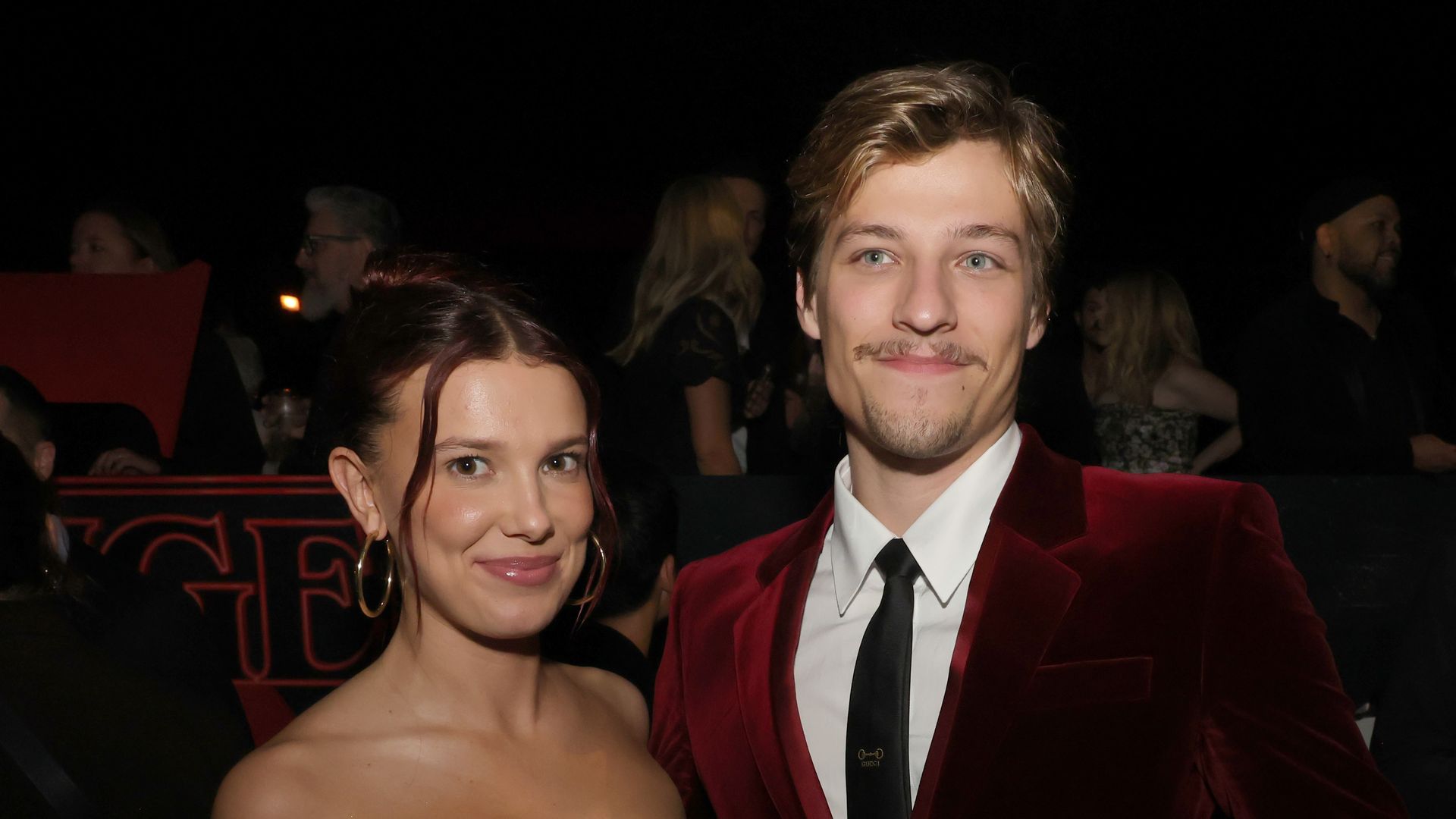 HOLLYWOOD, CALIFORNIA - NOVEMBER 06: Millie Bobby Brown (L) and husband Jake Bongiovi attend the after party for the Los Angeles Premiere of Netflix's "Stranger Things" Season 5 on November 06, 2025 in Hollywood, California. (Photo by Kevin Winter/GA/The Hollywood Reporter via Getty Images)
