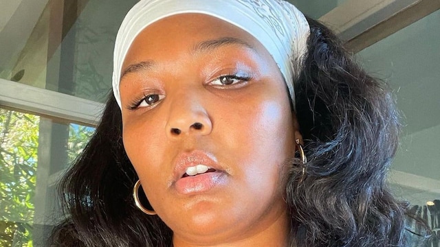 Lizzo sings "Cuz I Love You" while running on the treadmill