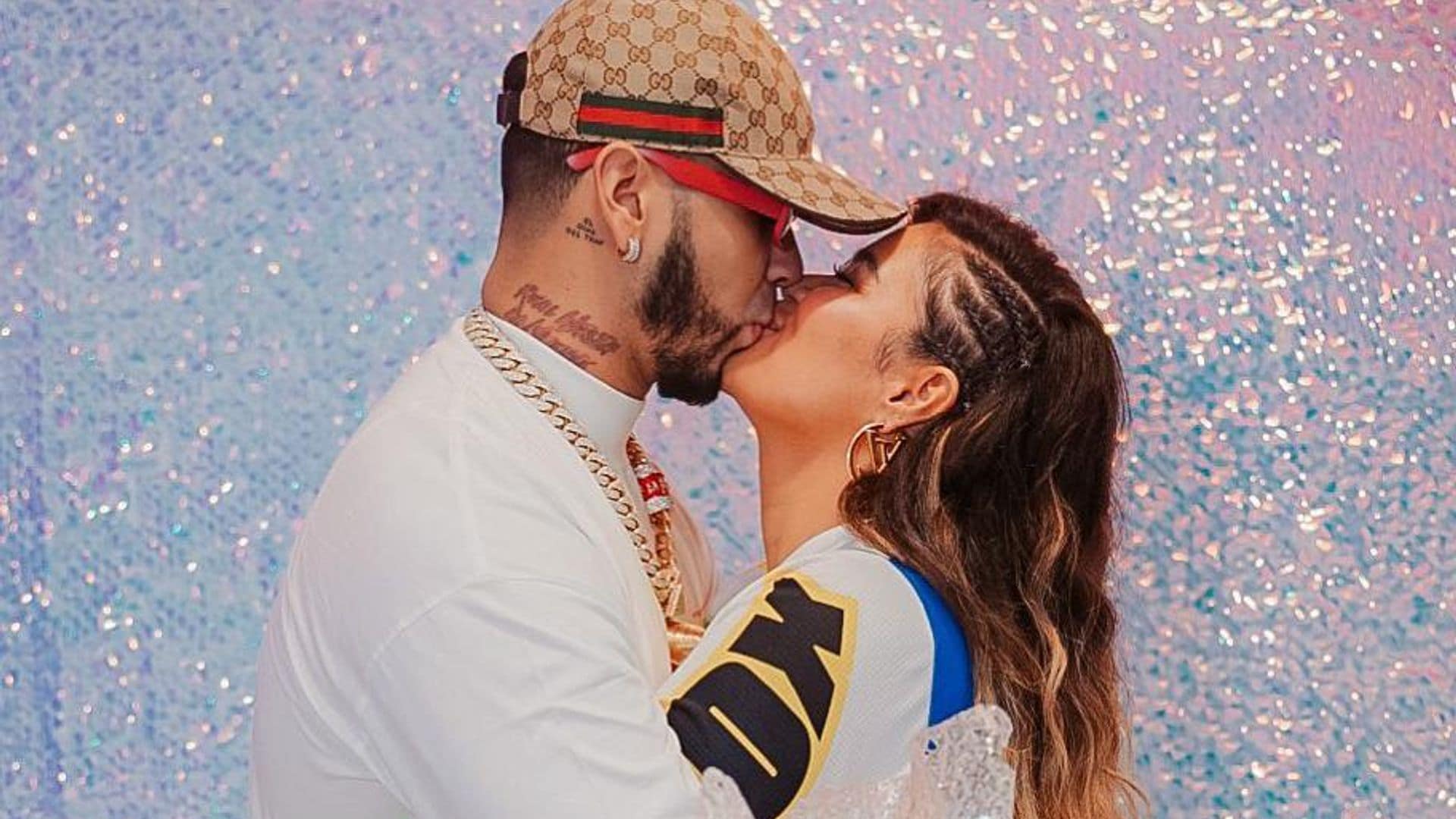 Anuel AA reveals he got Karol G’s face tattooed on him long before he proposed