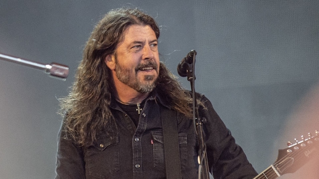 US musician Dave Grohl of rock band Foo Fighters performs on the Orange Stage at Roskilde Festival on July 5, 2024 in Roskilde, Denmark. (Photo by Helle Arensbak / Ritzau Scanpix / AFP) / Denmark OUT (Photo by HELLE ARENSBAK/Ritzau Scanpix/AFP via Getty Images) 
