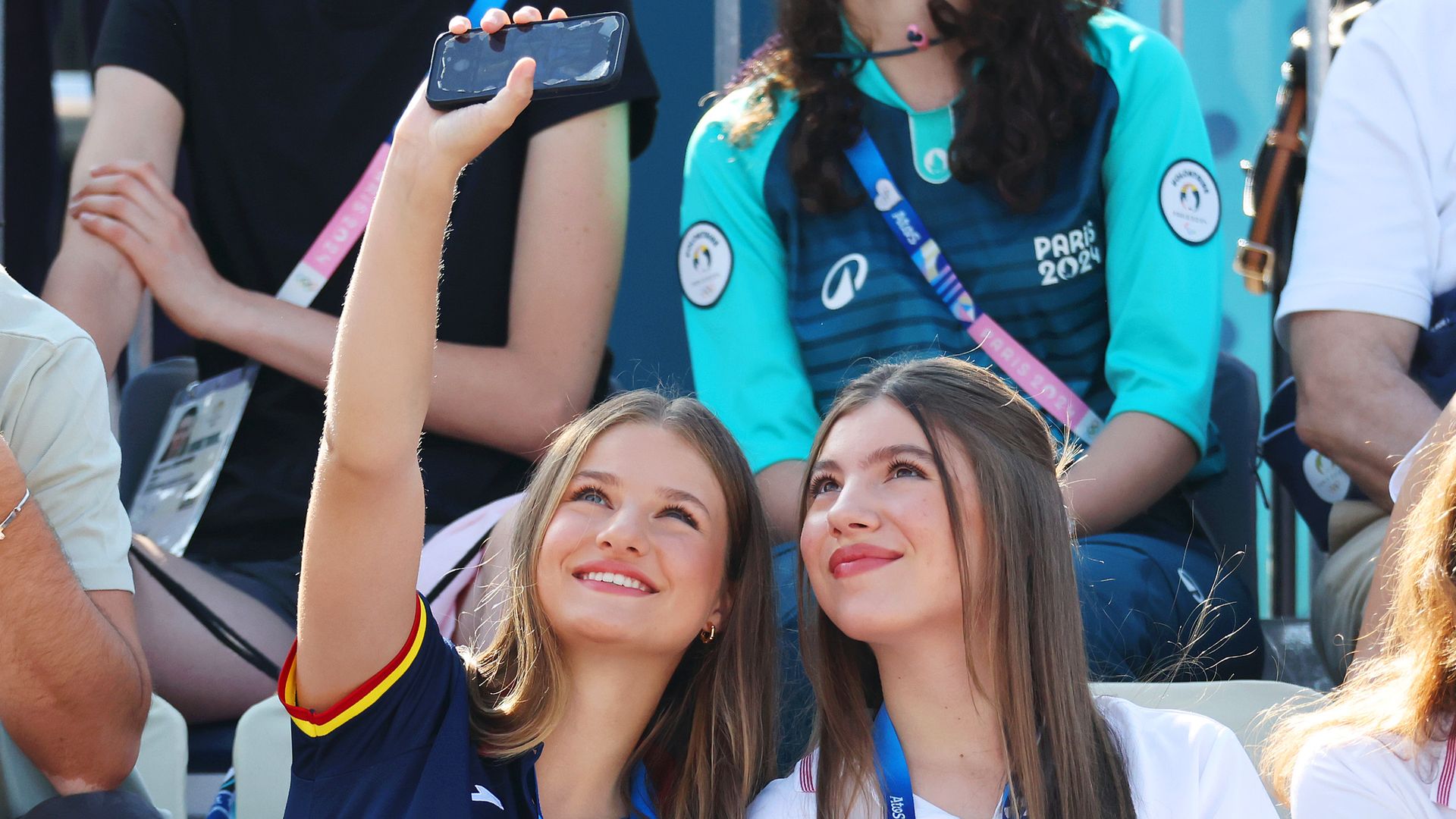 Sisters in Paris! Princess Leonor and Infanta Sofia meet with Rafael Nadal and snap selfies at the Olympics
